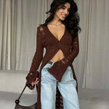 Langærmet strandvest med svaj i strik