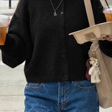 Kort strikket cardigan med knapper