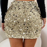 Mini bodycon-nederdel med pailletter forneden