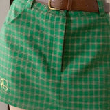 Lavtaljet ternet nederdel med broderi af bogstaver