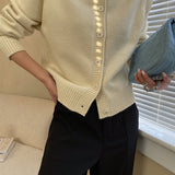 Raglanvest med jadeknapper