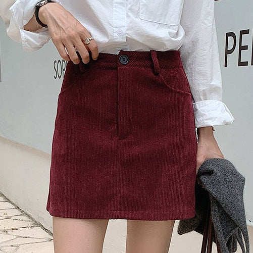 Højtaljet trapeznederdel i corduroy