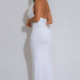 Bodycon blomsterprintet aftenkjole med åben ryg og halterneck-udskæring