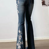 Vintage bootcut jeans med plantebroderi