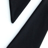 Rygløs aftenkjole med bindedetalje og høj slids