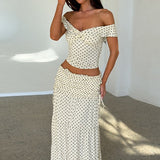 Prikket bustier maxinederdel med sløjfe i siden