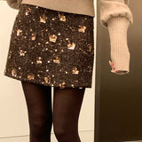 Højtaljet trapeznederdel broderet med pailletter