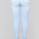 Højtaljede hvide skinny jeans