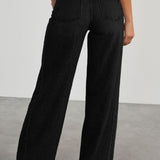 Minimalistiske, ensfarvede jeans med vide, falmede ben