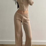 Sexet todelt mesh-sæt, tætsiddende og knappet, med lange ærmer og lav talje