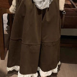 Højtaljet, lang nederdel med flæser i uldblanding