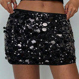 Mini bodycon-nederdel med pailletter forneden