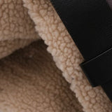 Lang jakke i kunstpels med flere lynlåse