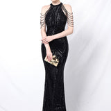 Paillettebesat havfrue-maxikjole med åben ryg