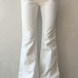 Hvide jeans med lav talje og bootcut-stræk