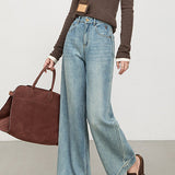 Højtaljede, bløde, broderede cropped jeans