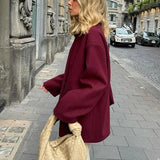 Uldfrakke med tørklædekrave og enkeltradede knapper