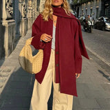 Uldfrakke med tørklædekrave og enkeltradede knapper