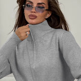 Todelt, tætsiddende striksæt med tovejslynlås for komfort på farten