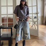 Vide, revnede og løstsiddende Capri-jeans