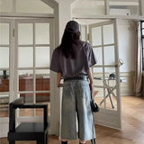 Vide, revnede og løstsiddende Capri-jeans