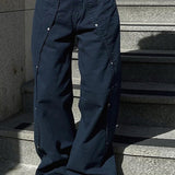 Cargobukser med vide ben, lav talje og nittede slidser