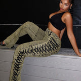 Denimjeans med snørebånd og snøre