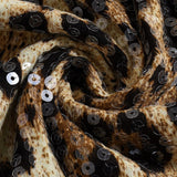 Kort stretchnederdel med leopardprint og pailletter.