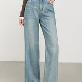 Højtaljede, bløde, broderede cropped jeans