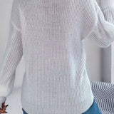 Løstsiddende, langærmet, enkeltradet strikcardigan