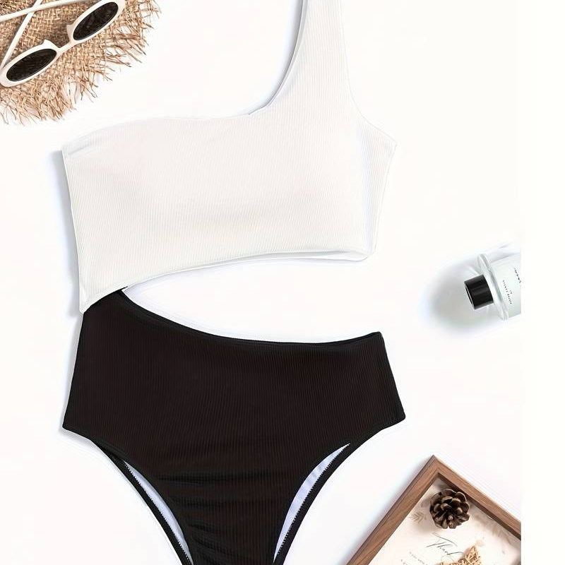 Damebadedragt – Helt stykke – Asymmetrisk halsudskæring – Højt udskårne ben – Ribbet stof