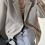 Oversized spættet blazer med knæ