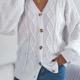 Løstsiddende, langærmet, enkeltradet strikcardigan