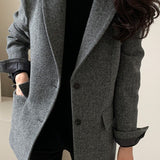 Ensfarvet blazer i uldblanding