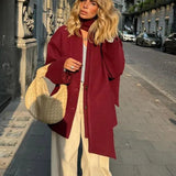 Uldfrakke med tørklædekrave og enkeltradede knapper