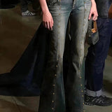 Lavtaljede jeans med svaj og nitter