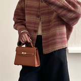 Ternet uldjakke, rund hals, enkeltradet, sænkede skuldre