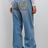 Vintage jeans med leopard- og stjernemærke