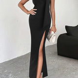 Rygløs aftenkjole med bindedetalje og høj slids