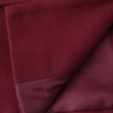 Uldfrakke med tørklædekrave og enkeltradede knapper