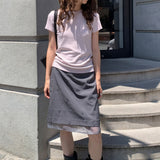 Mininederdel i mesh med broderi af blomster