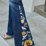 Skinny jeans med svaj og broderi af blomster