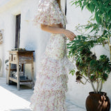 Todelt sæt med en lagdelt, flæset nederdel med slids