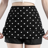 Trapeznederdel med polkaprikker