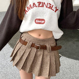 Højtaljet plisseret nederdel med houndstooth-mønster