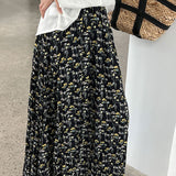 Højtaljet plisseret nederdel med retro blomsterprint