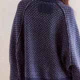 Oversized sweatshirt med rund hals og polkaprikker