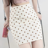 Trapeznederdel med polkaprikker