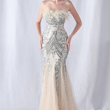 Aftenkjole med pailletter og strudsefjer