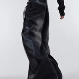 Jeans med vide ben i patchwork af PU-læder